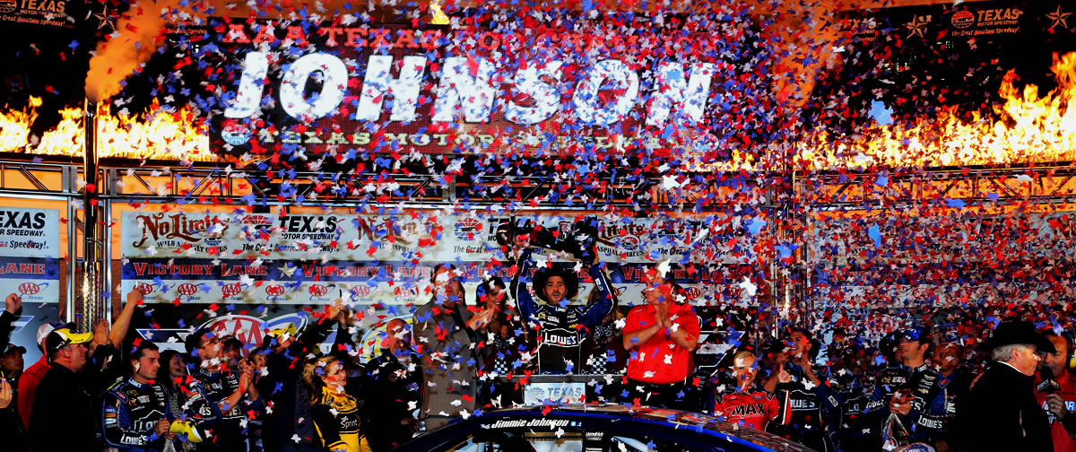 Jimmie Johnson celebrates in victory lane at Texas Motor Speedway