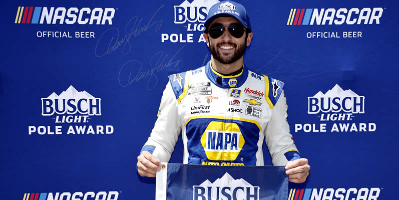 Chase Elliott poses for photos after winning the pole award