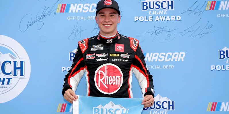 Christopher Bell poses for photos after winning the pole award