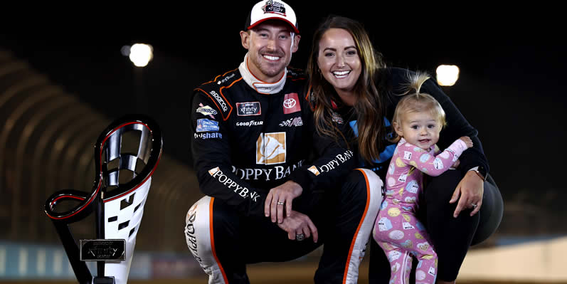 Daniel Hemric poses for photos with his wife and daughter