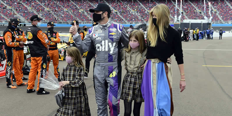 Jimmie Johnson walks the grid with his wife and daughters