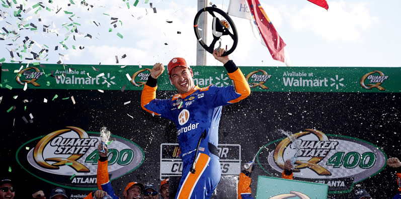  Joey Logano celebrates in victory lane