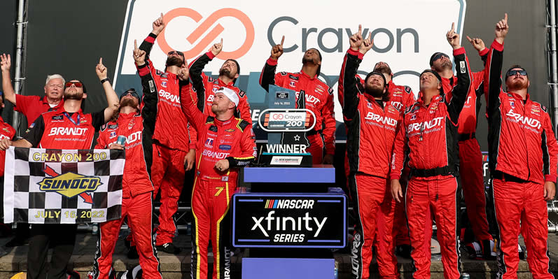 Justin Allgaier and crew celebrate in victory lane
