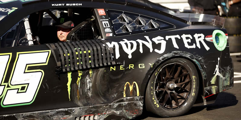 Kurt Busch sits on the grid after an on-track incident