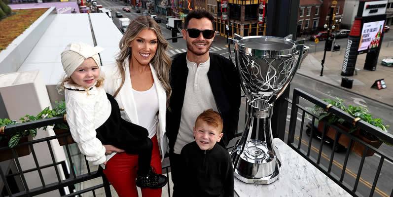 Kyle Larson his wife, son and daughter