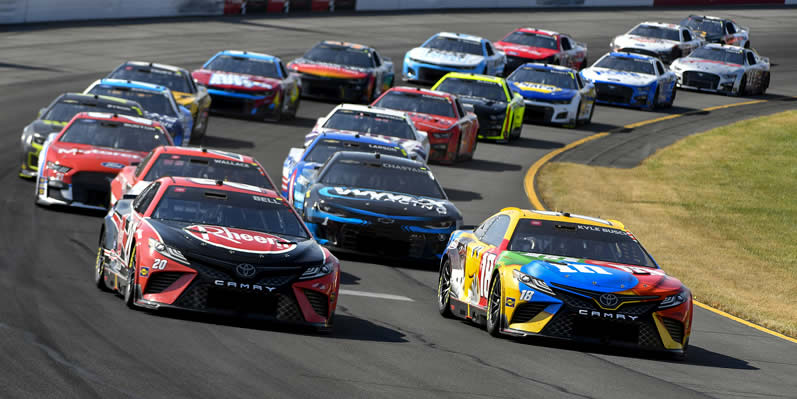 Kyle Busch and Christopher Bell race
