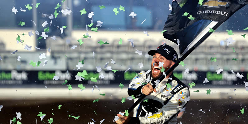 Ross Chastain celebrates after winning