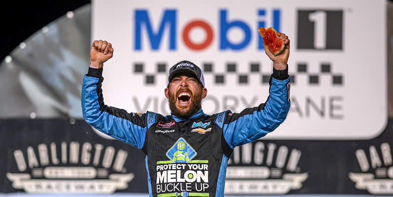 Ross Chastain celebrates in victory lane