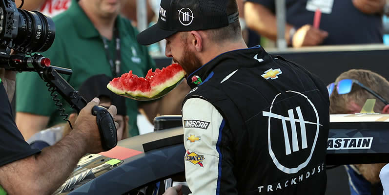 Ross Chastain celebrates by eating a watermelon