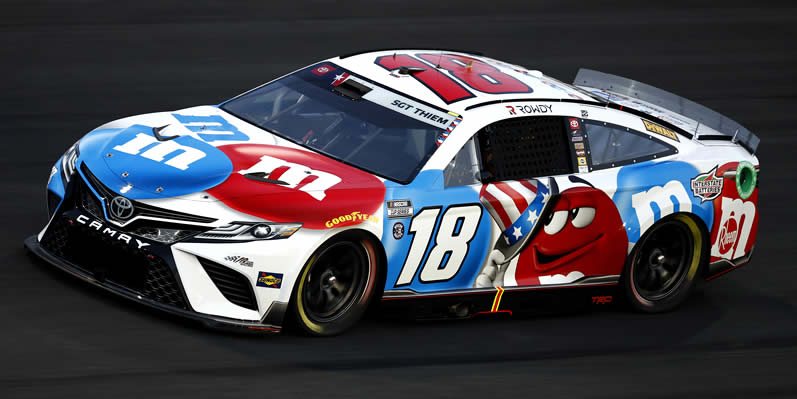 Kyle Busch drives during qualifying