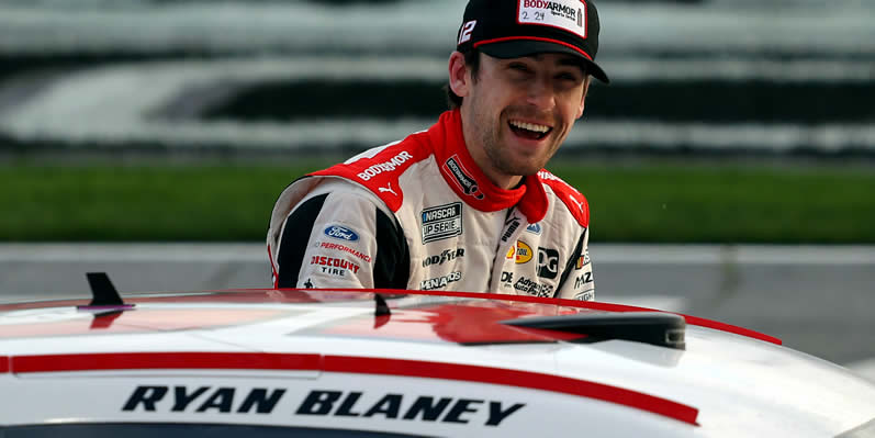 Ryan Blaney celebrates after winning the Folds of Honor QuikTrip 500