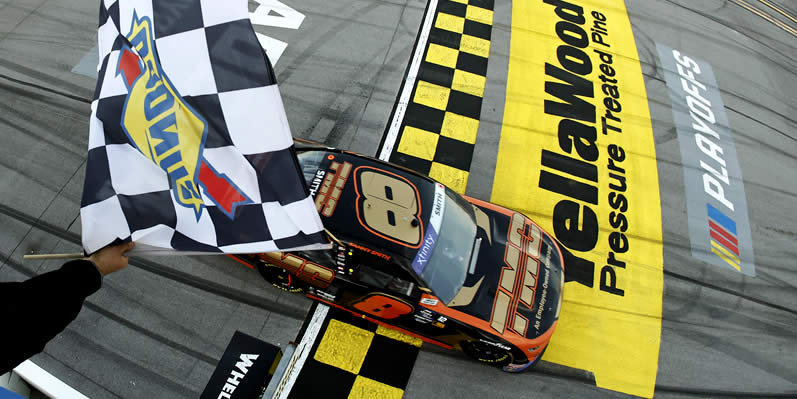 Sammy Smith takes the checkered flag to win