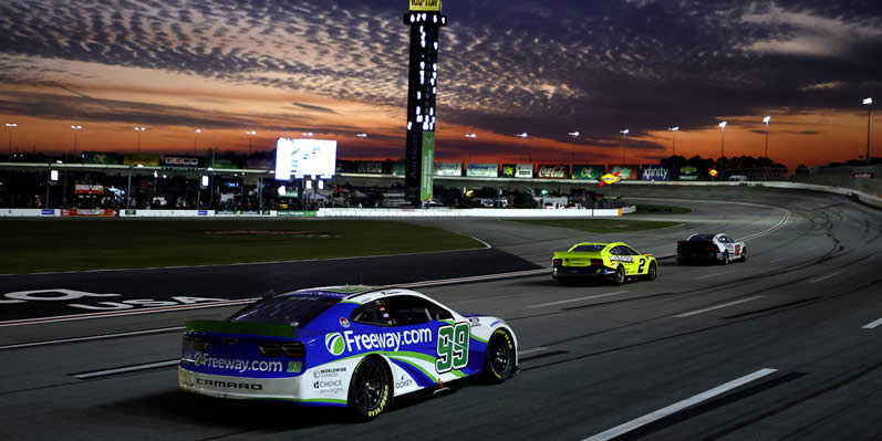 Daniel Suarez drives as the sunsets