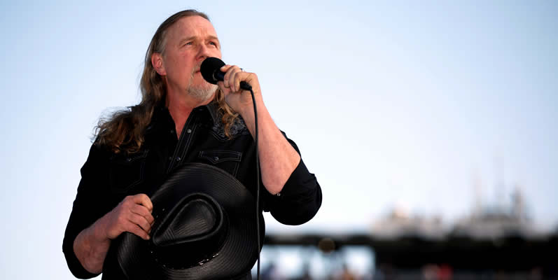 Singer Trace Adkins performs the national anthem