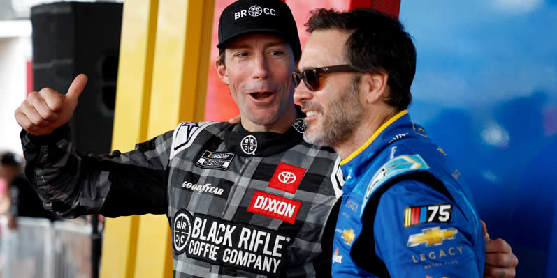 Travis Pastrana and Jimmie Johnson pose for photos