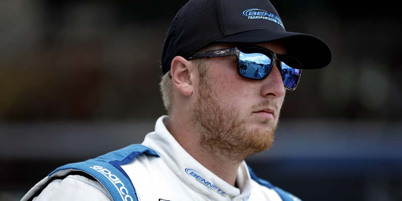 Austin Hill walks the grid during qualifying