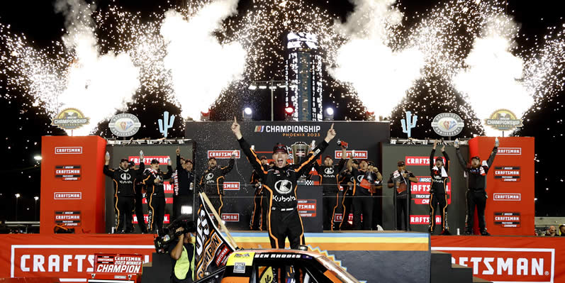 Ben Rhodes celebrates in victory lane