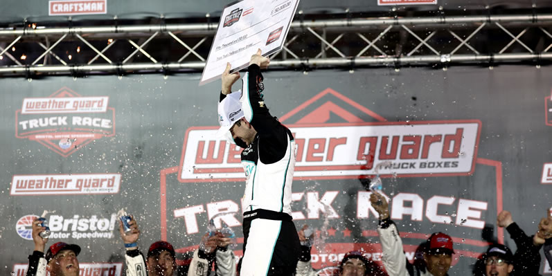 Chandler Smith celebrates in victory lane