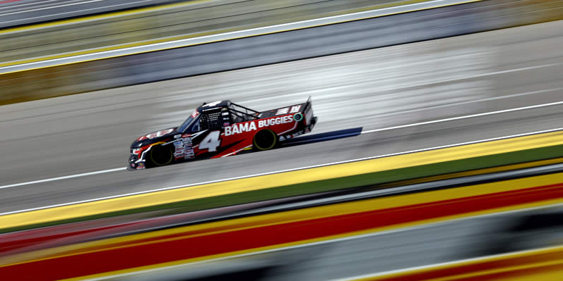 Chase Purdy drives during practice