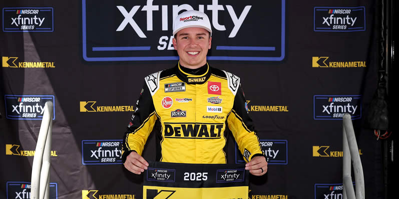 Christopher Bell poses for photos after winning the pole