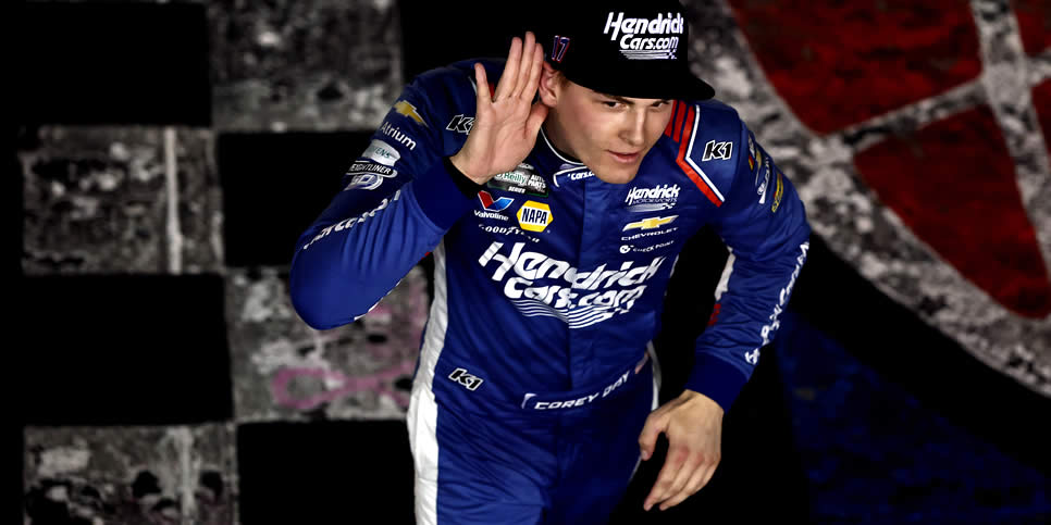 Corey Day gestures to fans after winning the Blue Cross NC 300