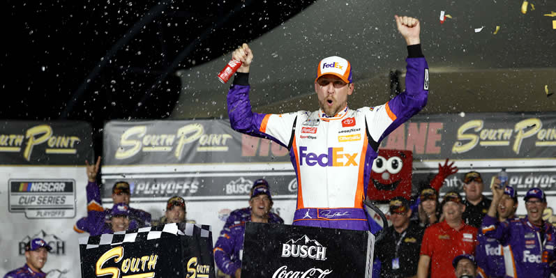 Denny Hamlin celebrates in victory lane at Las Vegas Motor Speedway