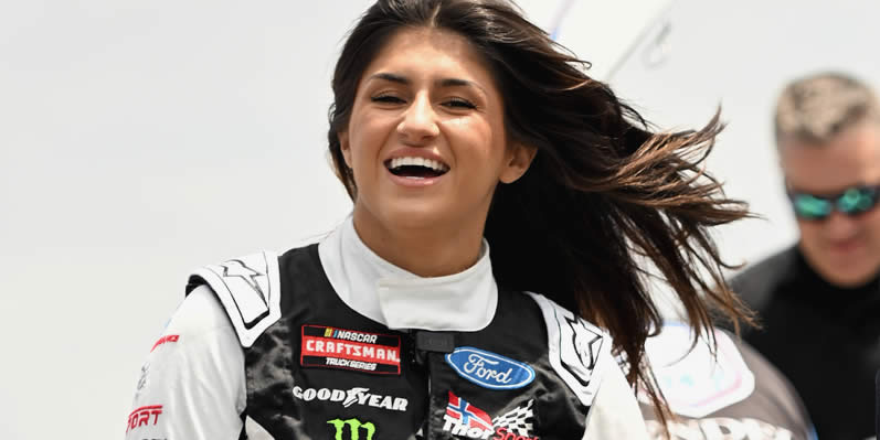 Hailie Deegan walks the grid during practice