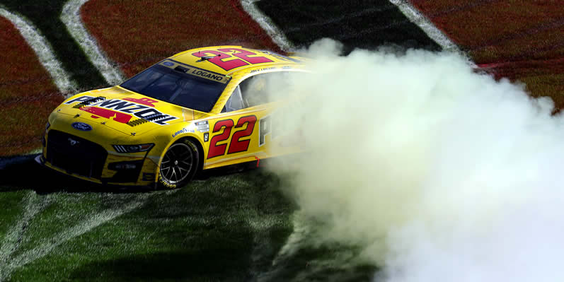  Joey Logano celebrates with a burnout