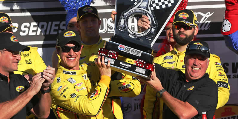 Joey Logano celebrates in Victory Lane