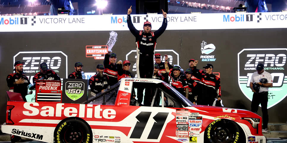 Kaden Honeycutt celebrates in victory lane after winning the Zero Carbon Bioethanol 150