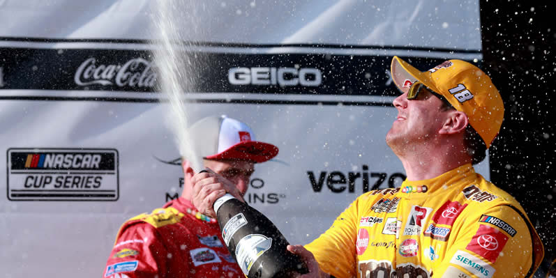 Kyle Busch celebrates in victory lane