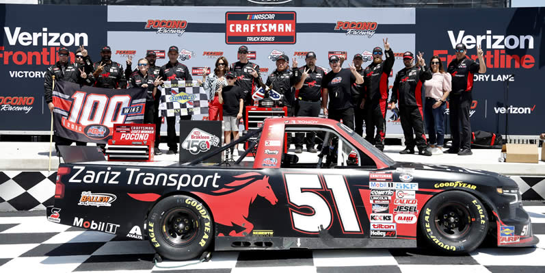 Kyle Busch celebrates with crew and family in victory lane