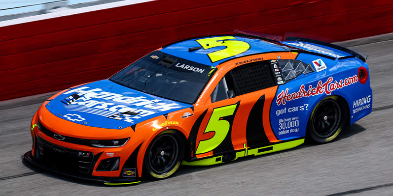 Kyle Larson drives during practice
