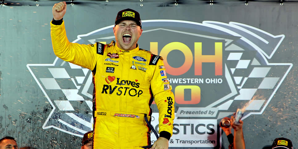 Layne Riggs celebrates in victory lane after winning at Bristol Motor Speedway