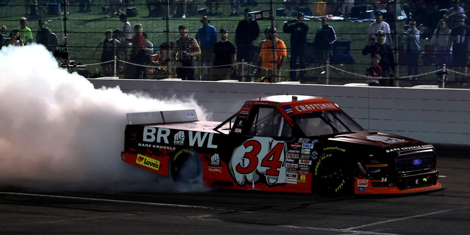 Layne Riggs celebrates with a burnout after winning
