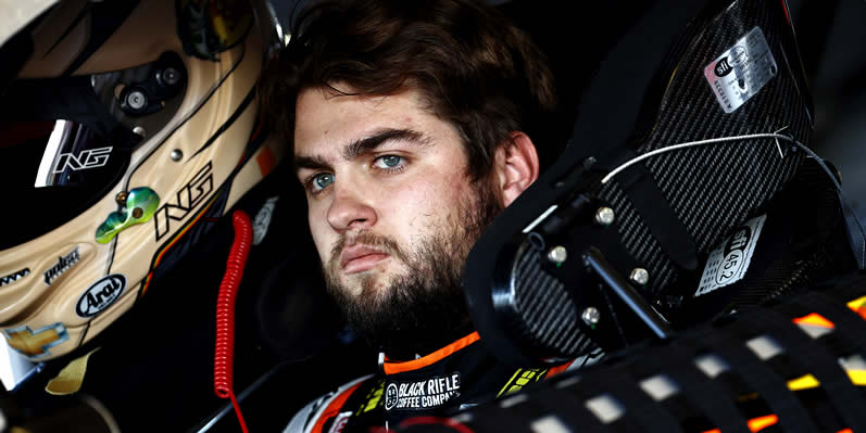 Noah Gragson sits in his car