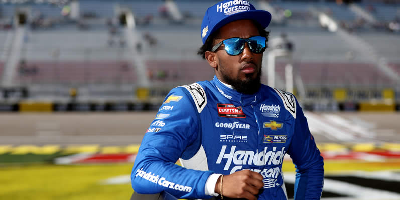 Rajah Caruth waits on the grid during practice