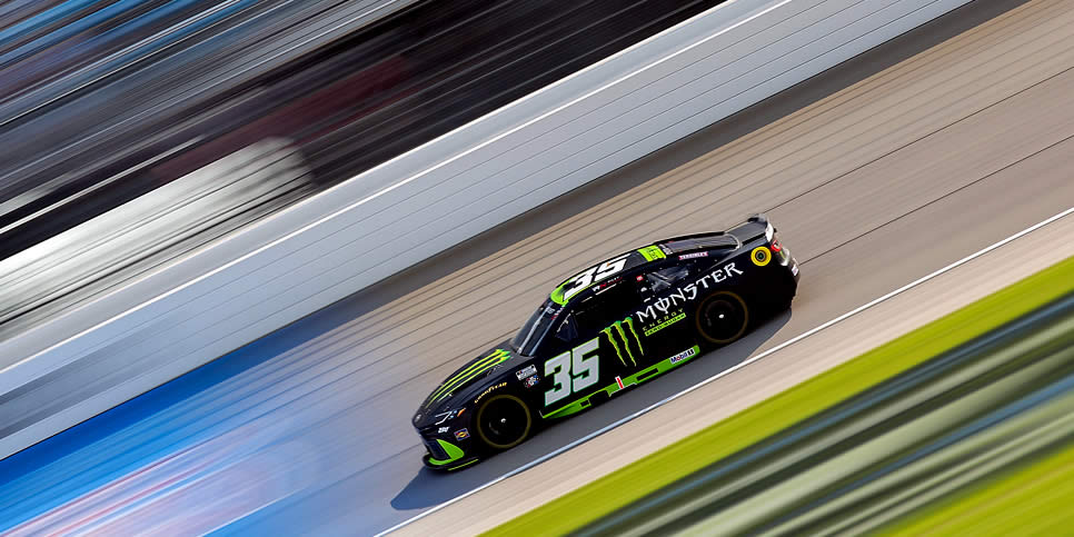 Riley Herbst drives during practice at Chicagoland Speedway