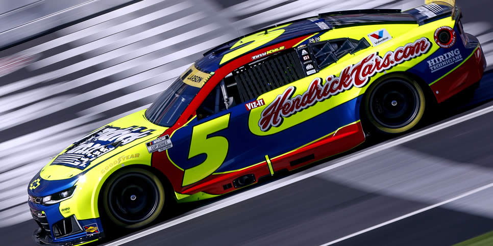 Kyle Larson  drives during practice