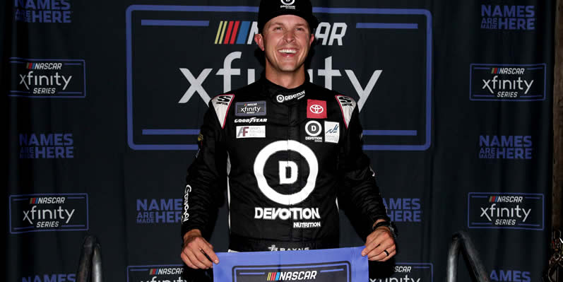 Trevor Bayne poses for photos after winning the pole award