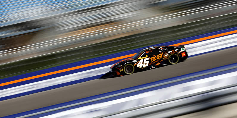 Tyler Reddick drives during practice