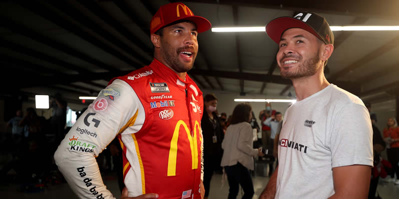 Bubba Wallace talks with Kyle Larson in victory lane at Talladega Superspeedway